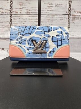 Louis Vuitton Limited Edition Aqua Epi Leather Twist WOC